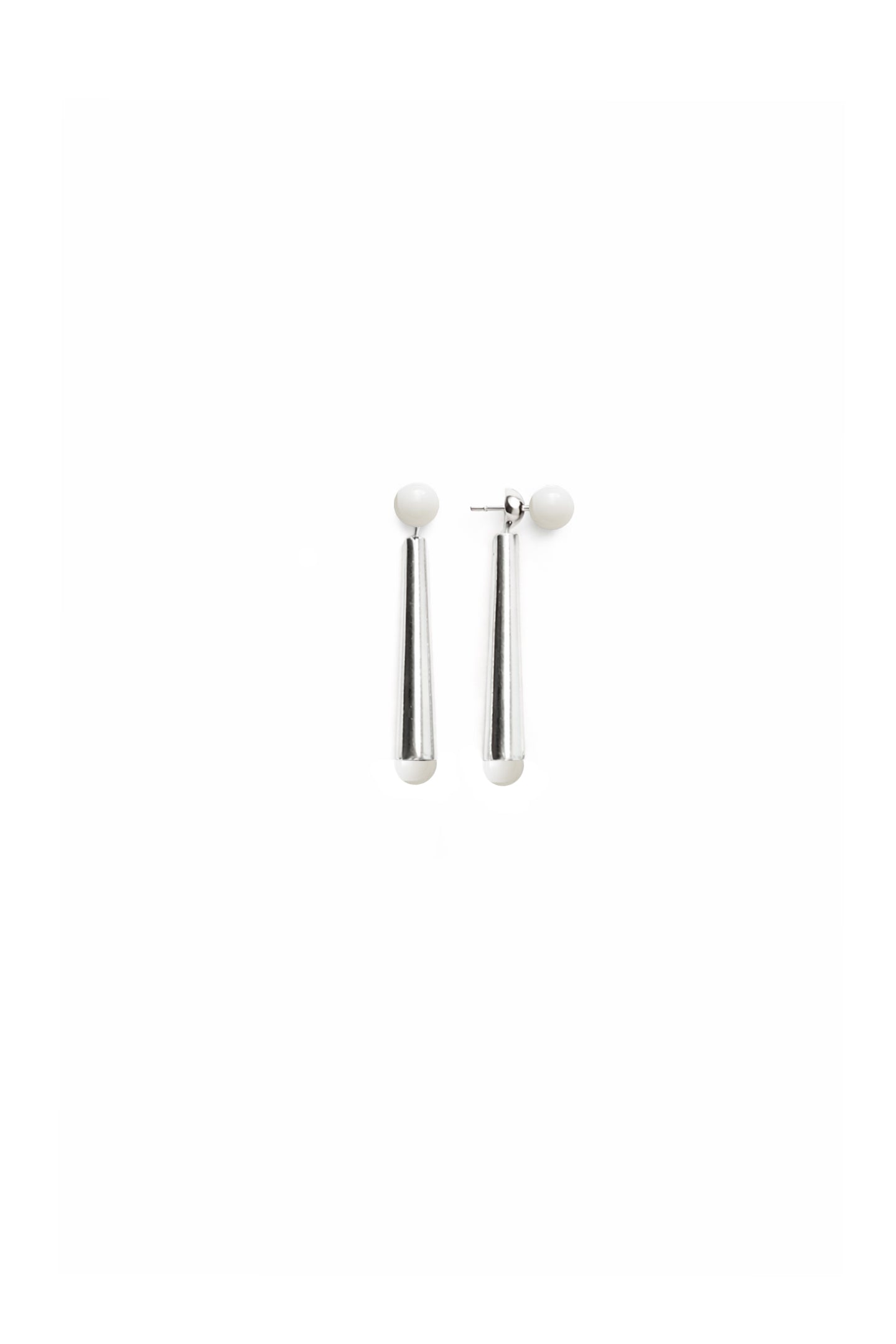 Flores earrings handcrafted in sterling silver and set with polished onyx or white agate, a refined modernist interpretation of the classic drop.