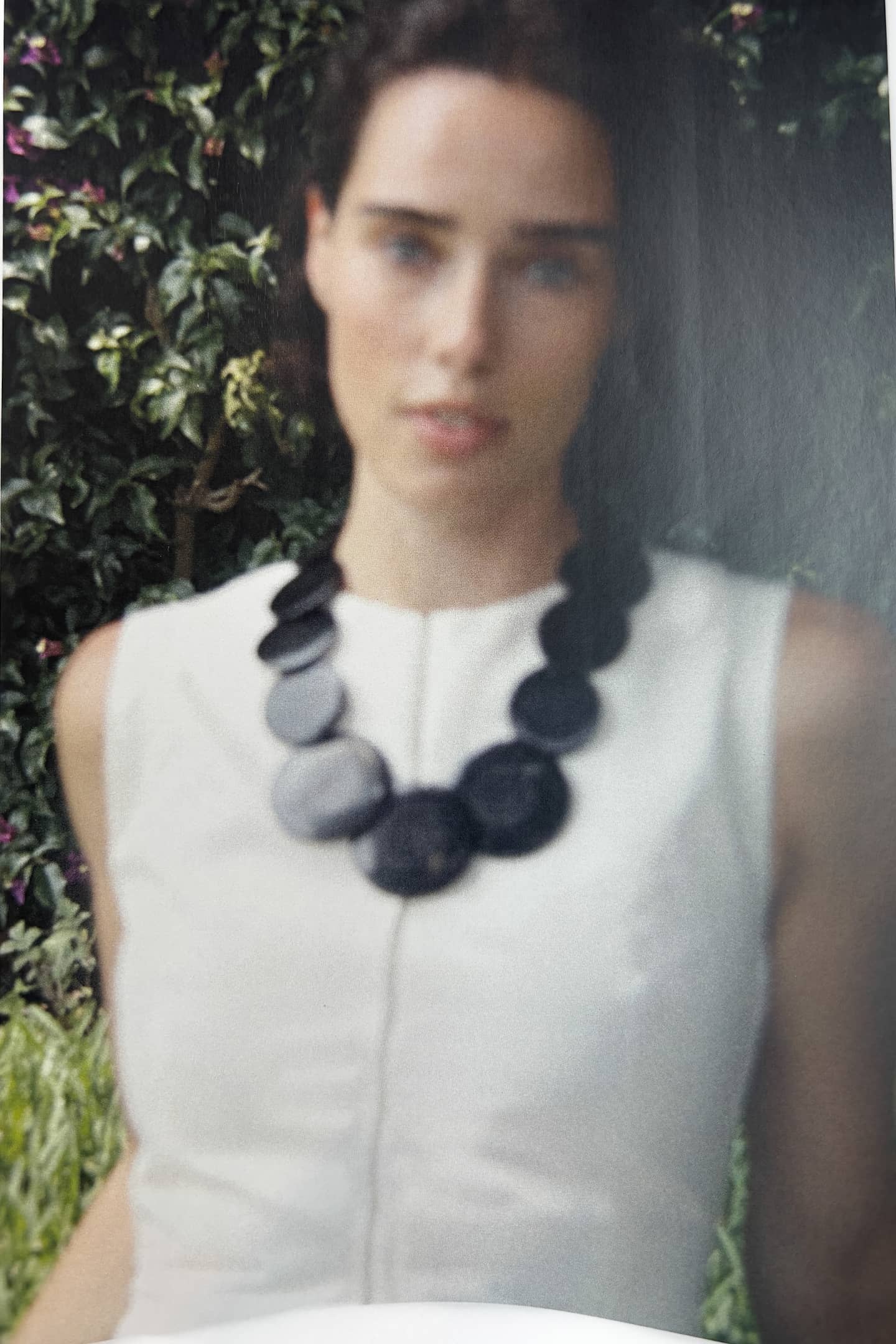Full view of MERON handcrafted necklace displaying natural bone bead pattern and elegant design
