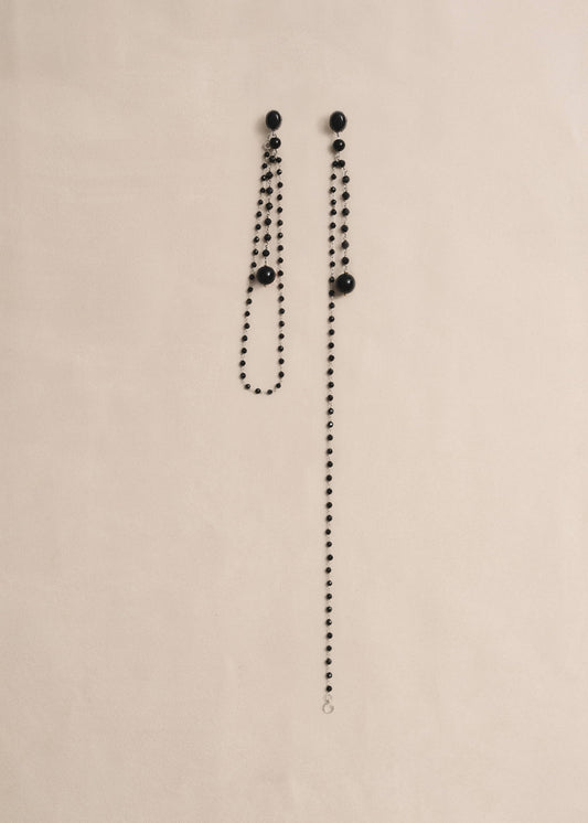 Handmade statement earrings in onyx and sterling silver, meticulously assembled by hand in Mosquito’s atelier.