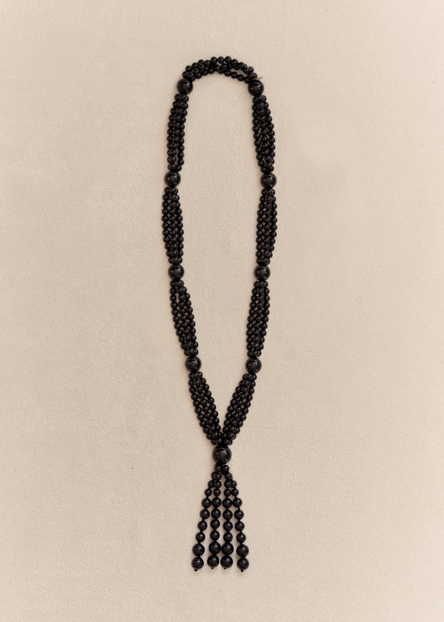 Handcrafted with polished onyx beads and sterling silver details, the Farol Necklace is a modern heirloom made to be worn for years.
