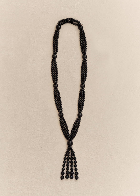 Handcrafted with polished onyx beads and sterling silver details, the Farol Necklace is a modern heirloom made to be worn for years.