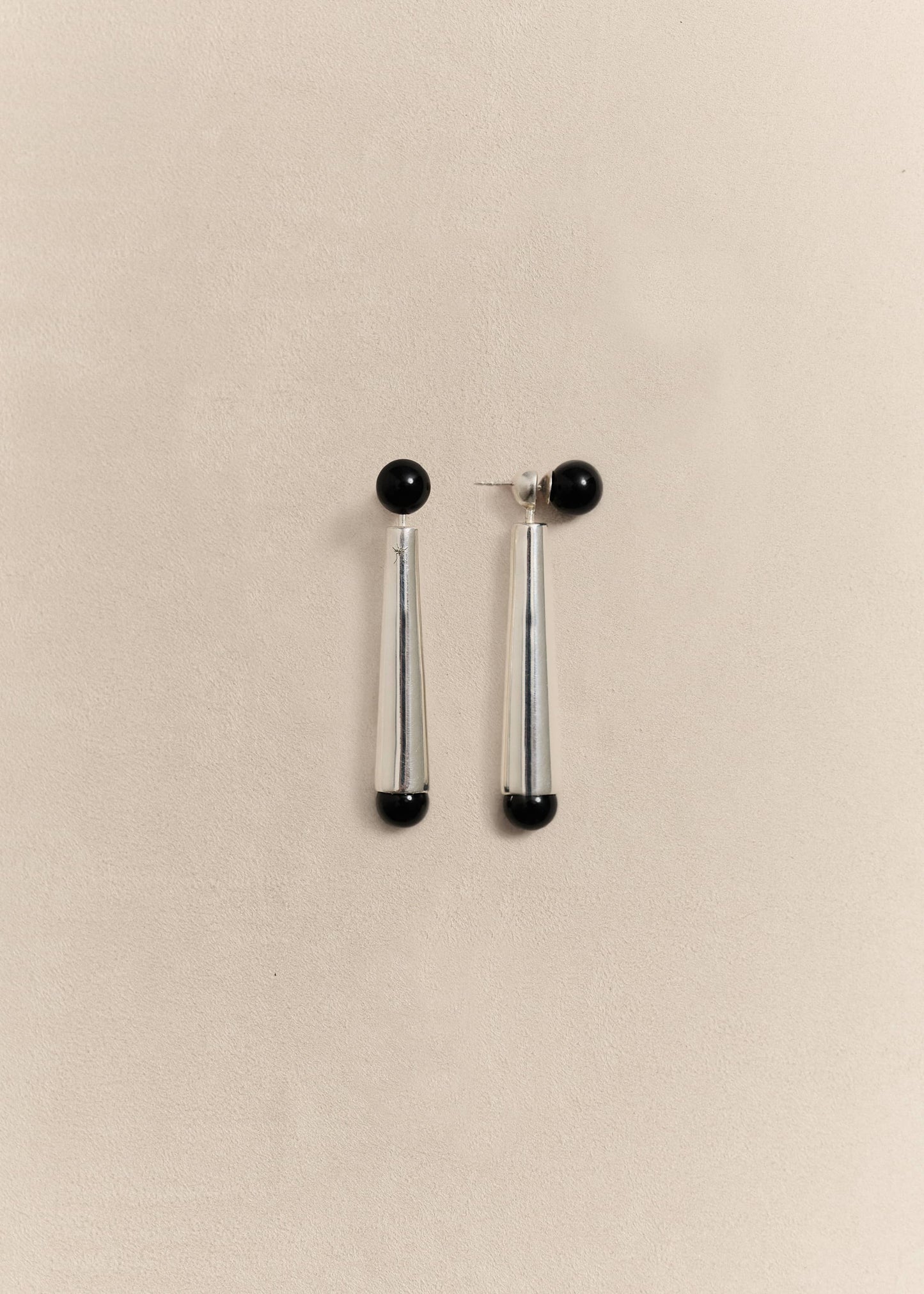 Handcrafted sterling silver earrings inspired by organic forms. Quietly sculptural, timeless and made in small batches.