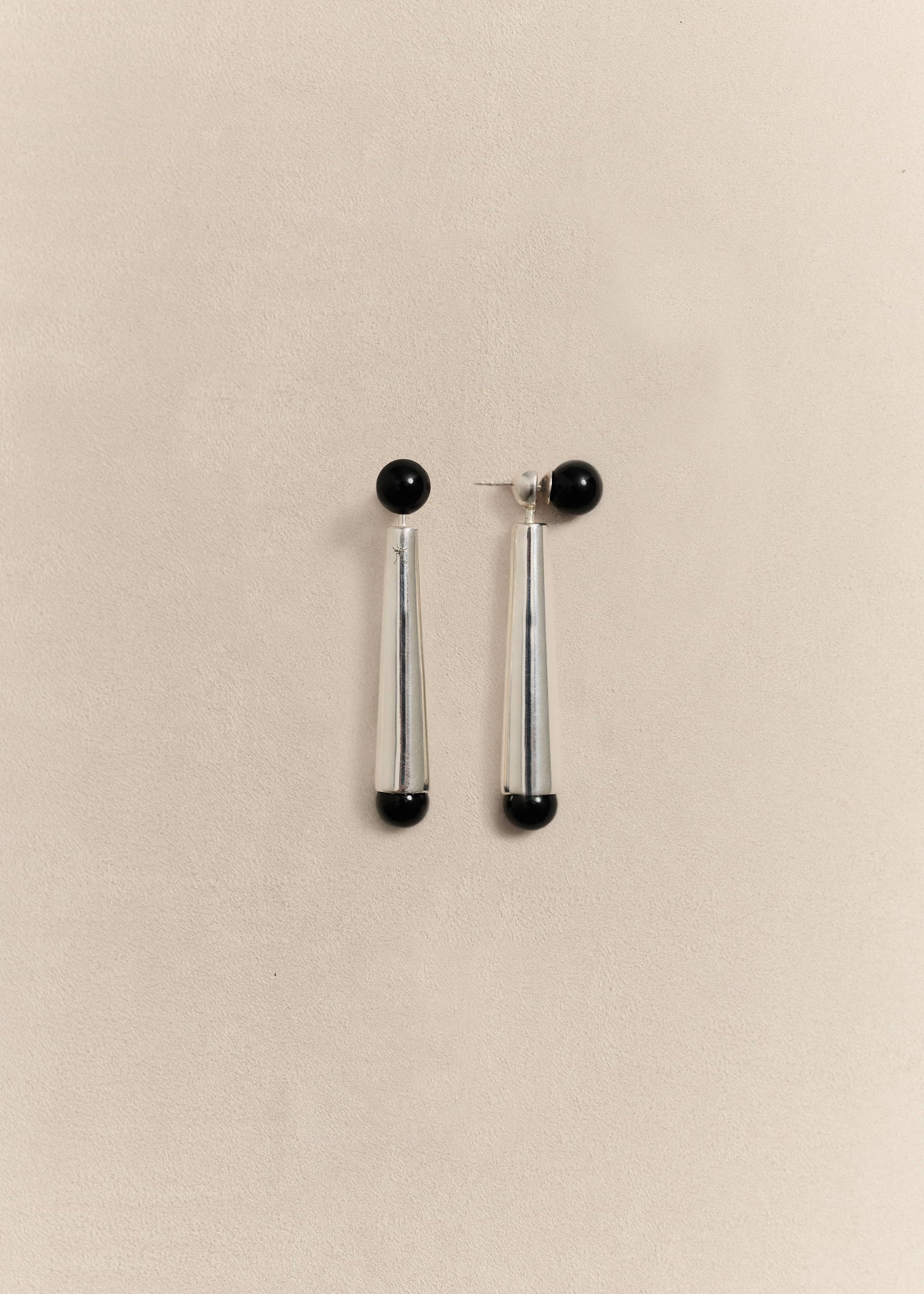 Handcrafted sterling silver earrings inspired by organic forms. Quietly sculptural, timeless and made in small batches.