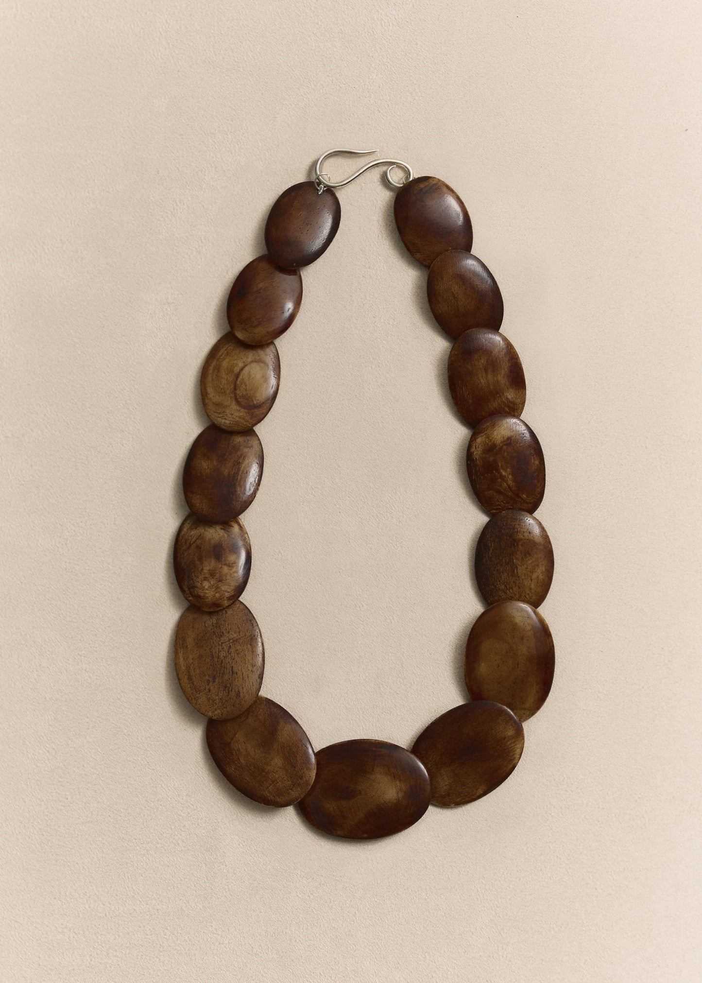 Handcrafted from responsibly sourced natural bone and sterling silver. A timeless statement necklace made in small batches.