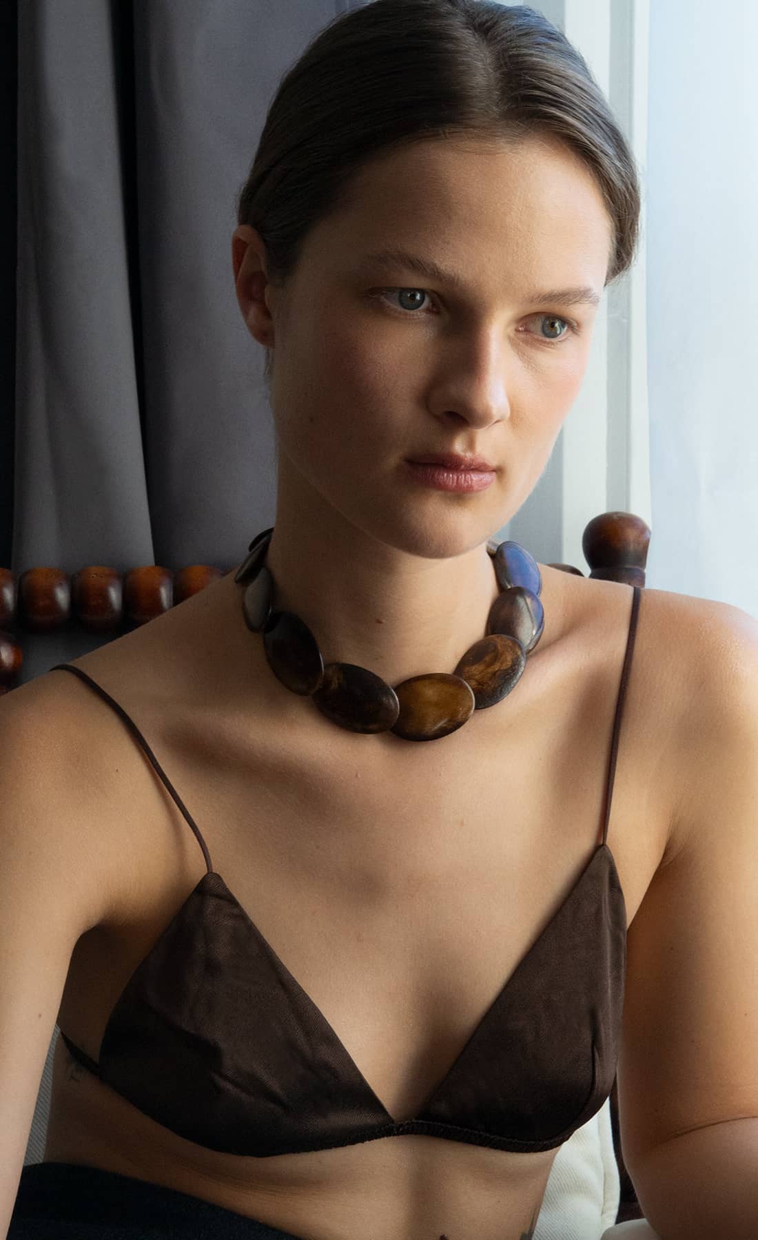 Handcrafted in Spain, the Gaviota necklace is made from upcycled bone beads and finished with an 18k gold–plated sterling silver clasp.