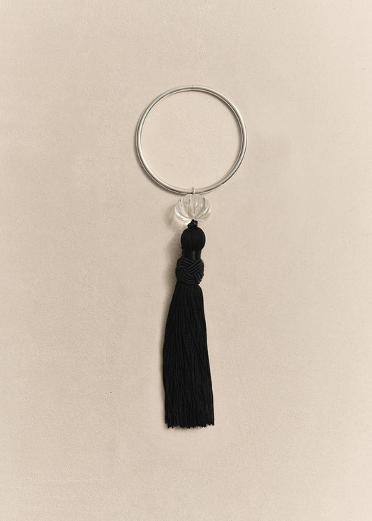 A handcrafted sterling silver bracelet finished with natural materials and refined details. Designed to last a lifetime.