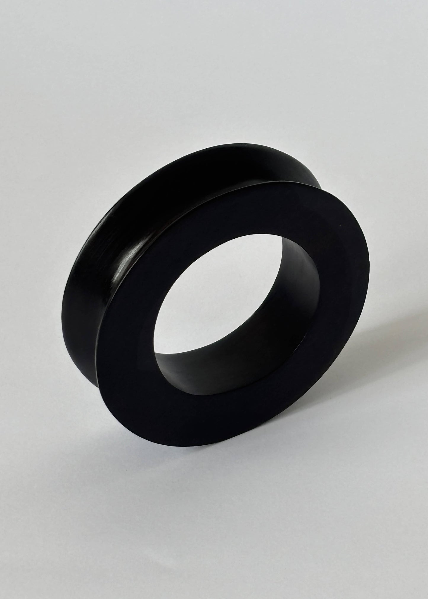 Handcrafted in sterling silver, the Nido Bangle explores sculptural form, balance and proportion through timeless craftsmanship.