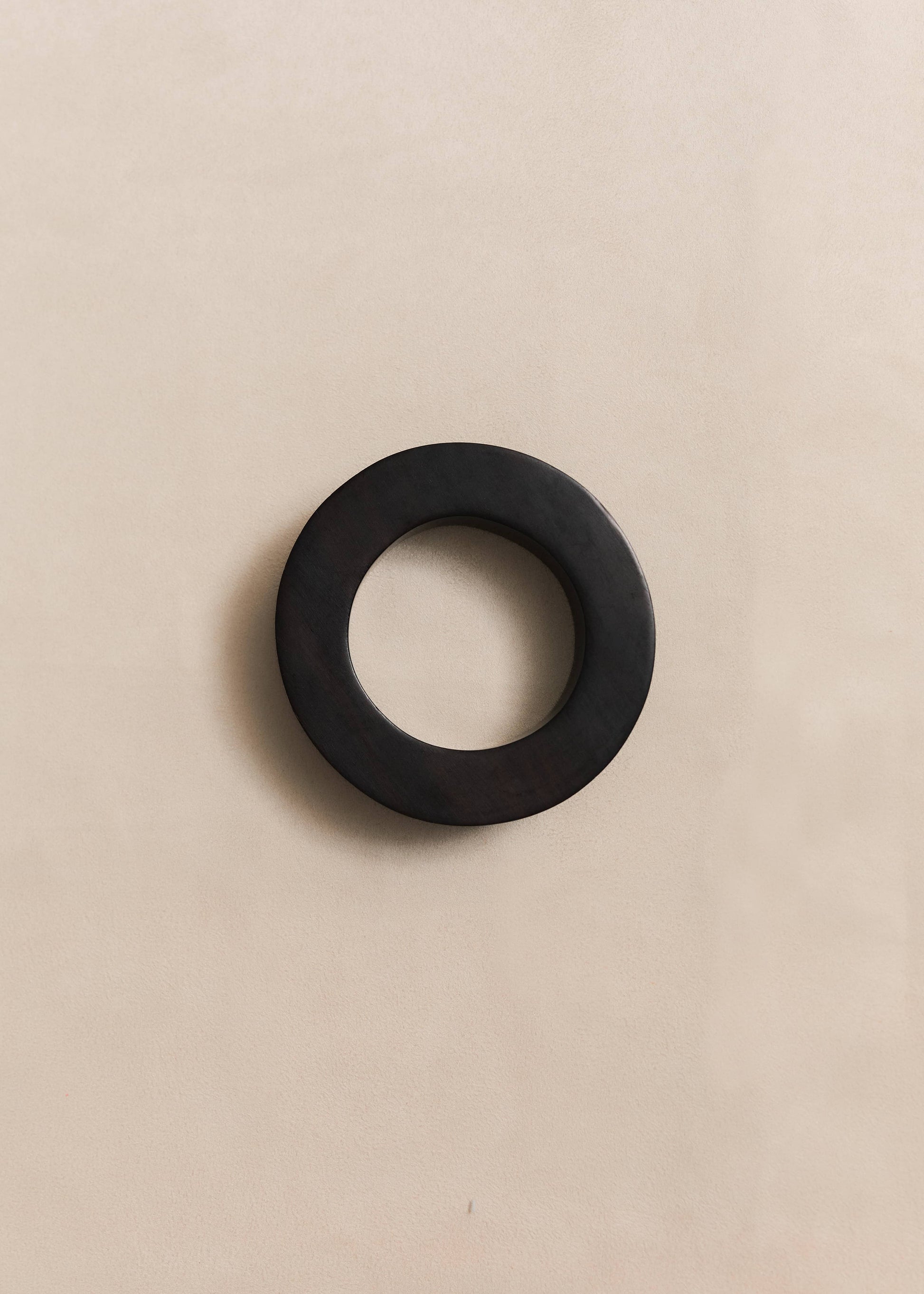 The Nido Bangle is a handcrafted sterling silver bracelet defined by sculptural curves and a quiet, timeless presence. Made by hand in small batches.