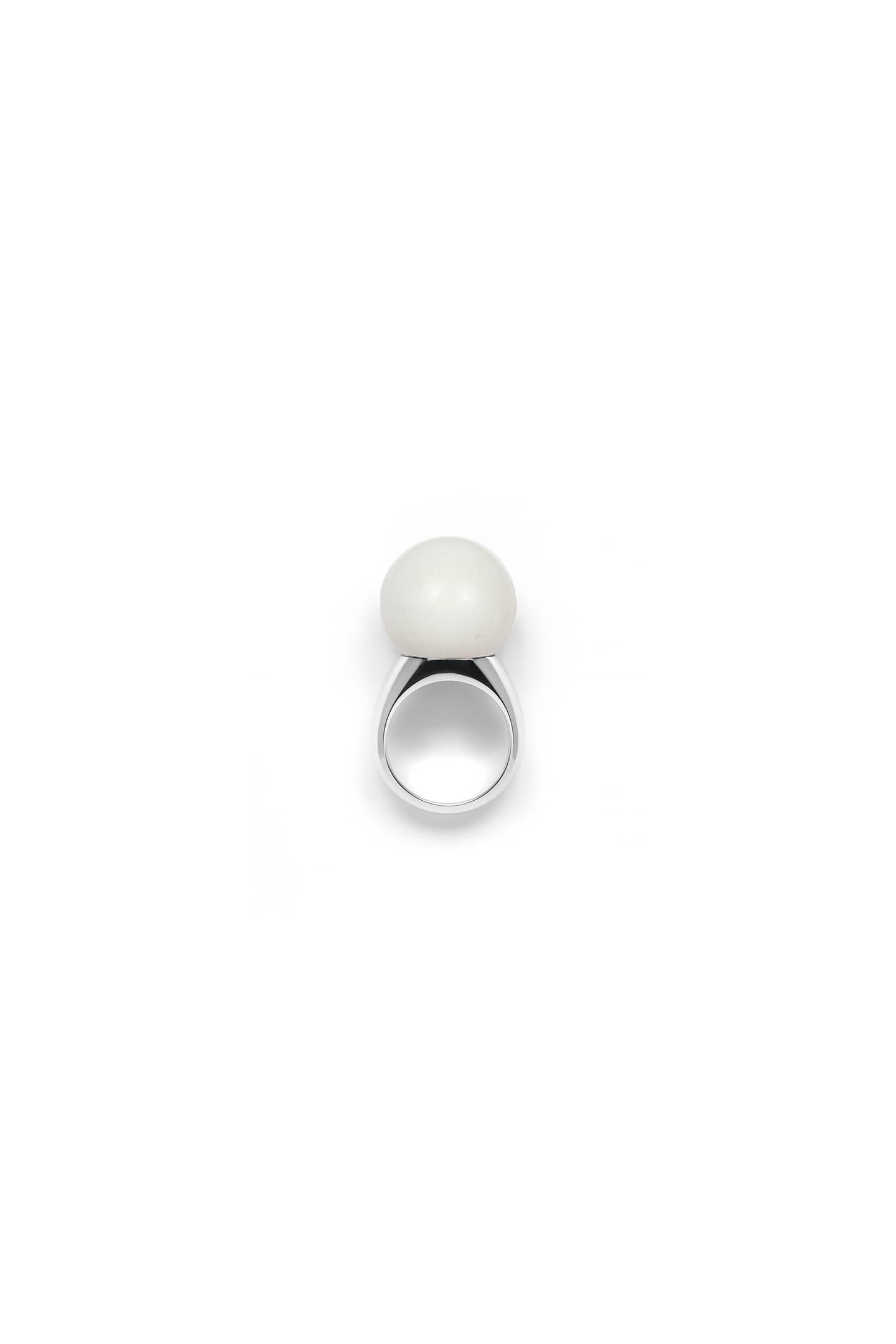 A clean, modern silver ring handcrafted with a natural white agate stone.