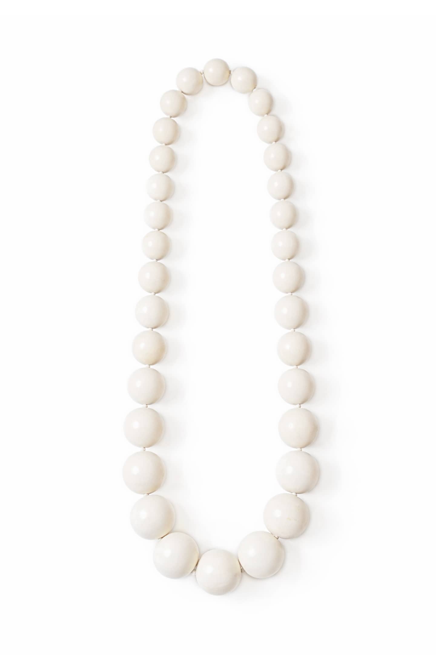 Positana handcrafted necklace made with natural yakal wooden beads, crafted slowly in our atelier.