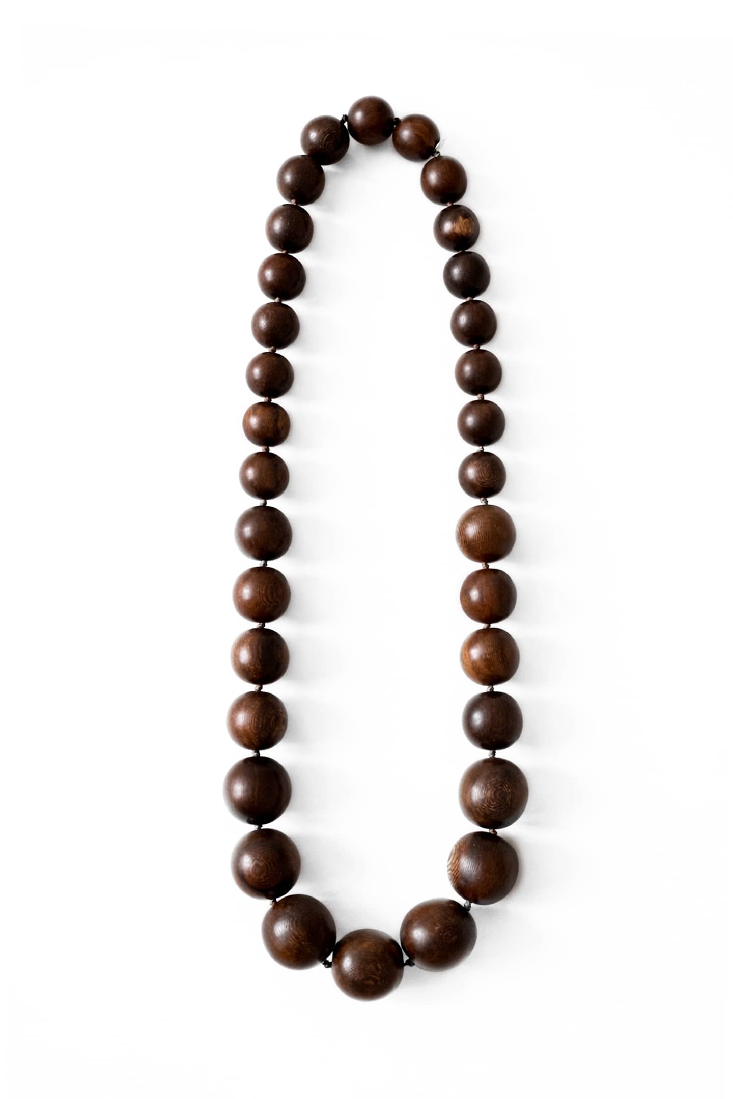 Positano handcrafted necklace made with natural oak wooden beads, crafted slowly in our atelier.