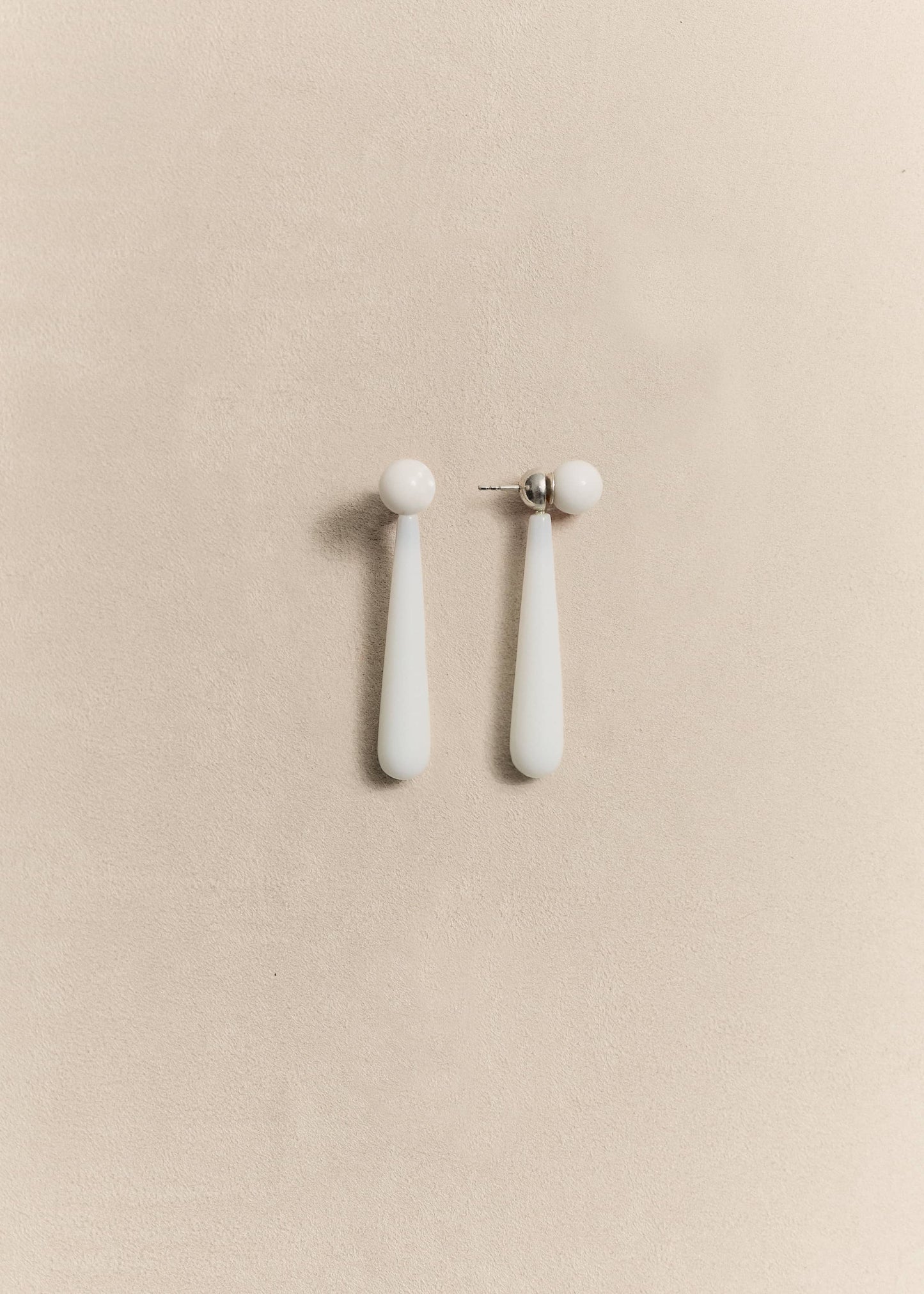 Handcrafted sterling silver earrings finished with natural agate beads. Timeless pieces made slowly by hand.