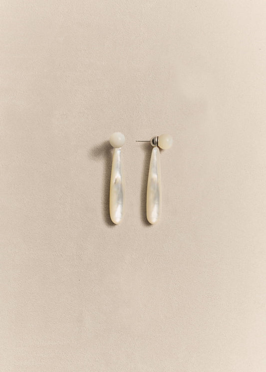 Handcrafted sterling silver drop earrings finished with luminous mother of pearl. Elegant, timeless and made in small batches.