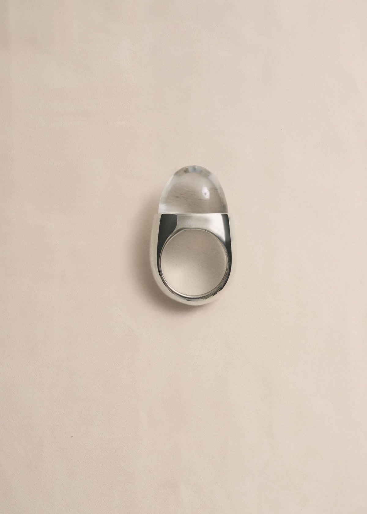 URSA handcrafted statement ring featuring a rock crystal cabochon and rhodium-plated sterling silver by Mosquito.