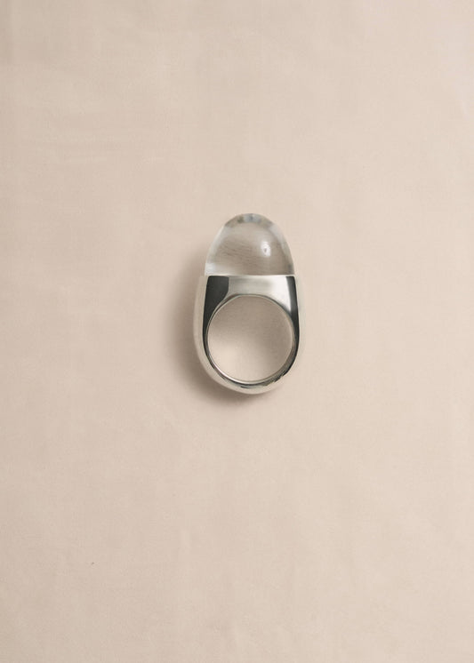 URSA handcrafted statement ring featuring a rock crystal cabochon and rhodium-plated sterling silver by Mosquito.