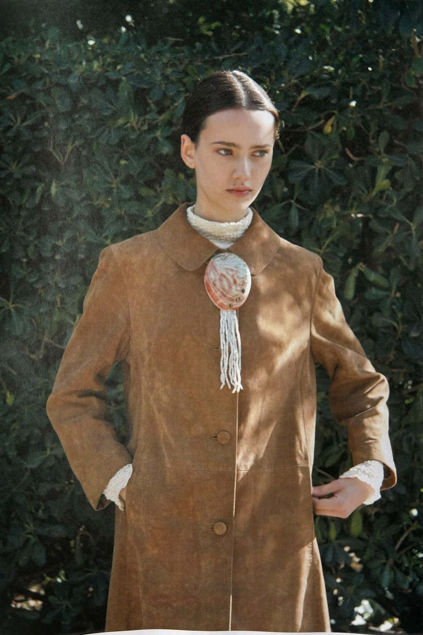 ABALONE vintage shell brooch worn as elegant sustainable jewelry accessory blending luxury and sustainability