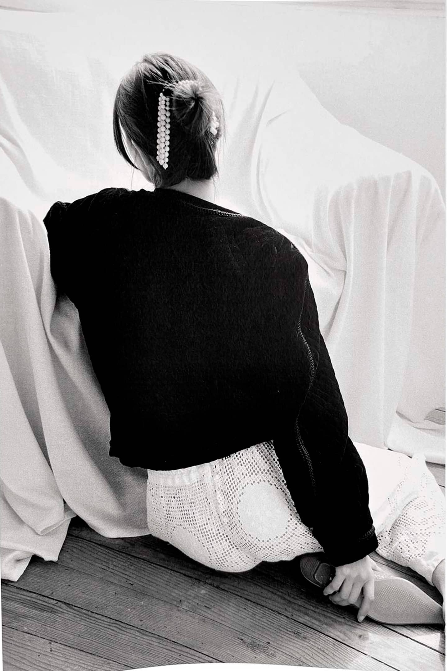 CANDE handcrafted hair comb with jade tassels worn as elegant sustainable hair accessory