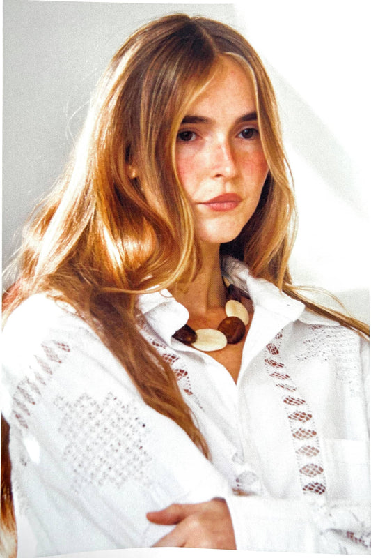 Close-up detail of PALOMA necklace showing upcycled bone beads natural texture and sustainable artisan craftsmanship